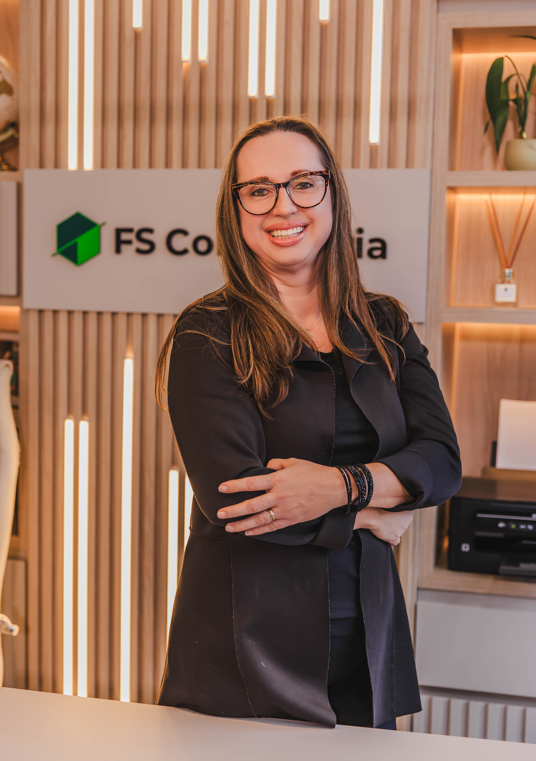 Profissional da FS Consultoria em posição corporativa